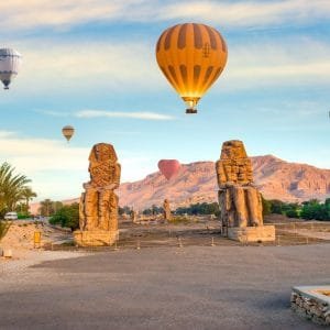 Hot,Air,Balloons,Over,Colossi,Of,Memnon,In,Luxor,,Egypt